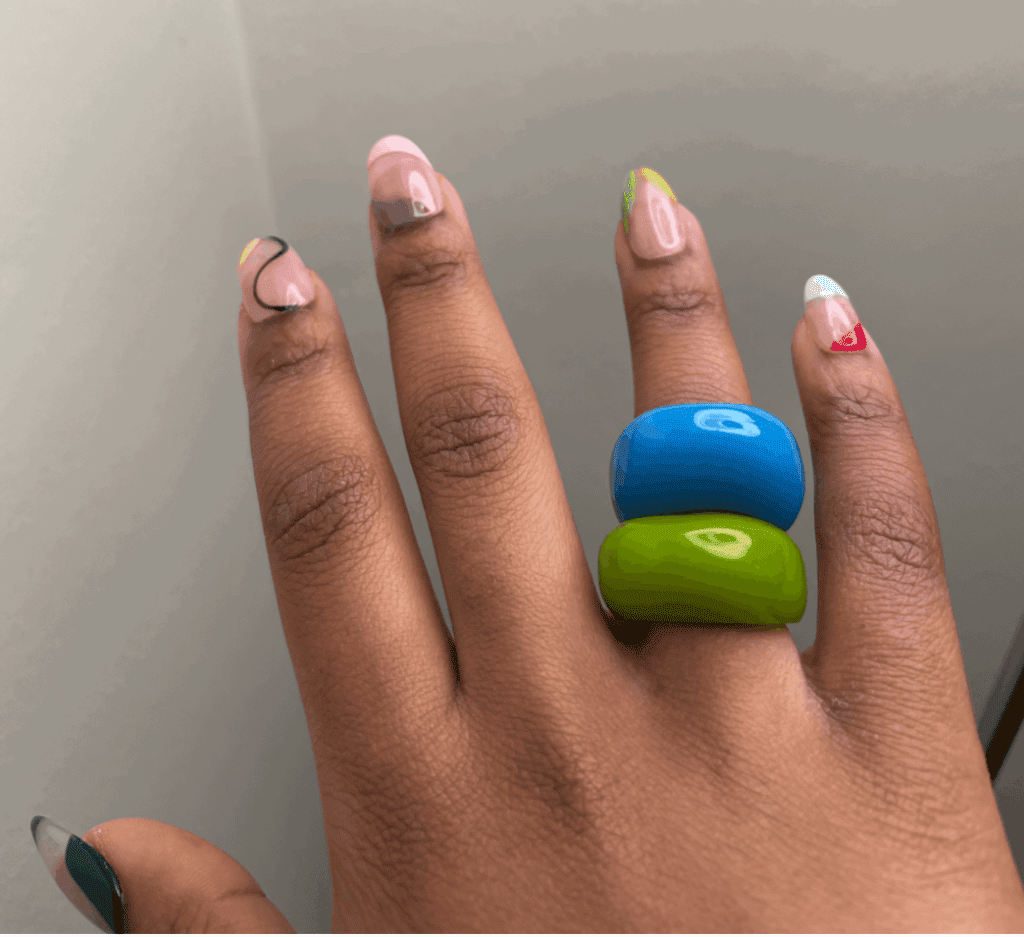 A blue and green resin ring