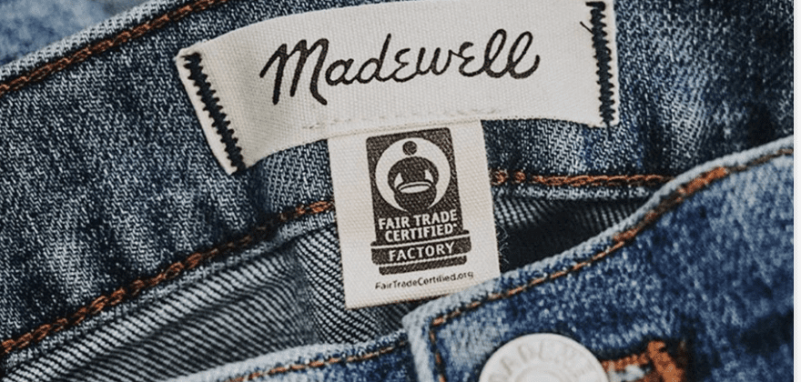 A Fair Trade Certified label on a pair of denim jeans
